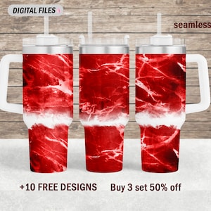 May include: Three stainless steel tumblers with red marble pattern and white lids. The tumblers have a white handle and are designed for hot or cold beverages.  The text "seamless" is visible in the top right corner of the image.  The text "Buy 3 set 50% off" is visible in the bottom right corner of the image.  The text "+10 FREE DESIGNS" is visible in the bottom left corner of the image.
