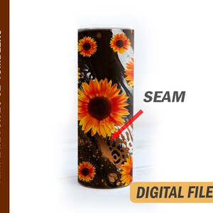 May include: A 20 oz tumbler template featuring a black background with a white and gold abstract design and a pattern of sunflowers. The word "SEAM" is written in red on the right side of the image.