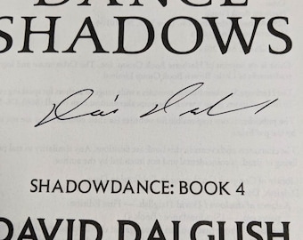 May include: A Dance of Shadows book cover with the title and author's name, David Dalglish. The book is part of the Shadowdance series and is book number 4. The author has signed the book.