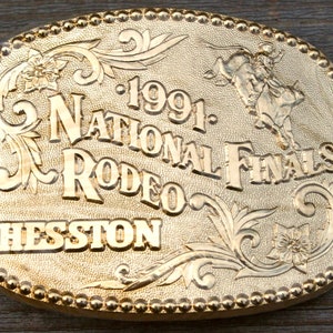 Agco/Hesston 1991  NFR Gold Belt Buckle *Never worn*