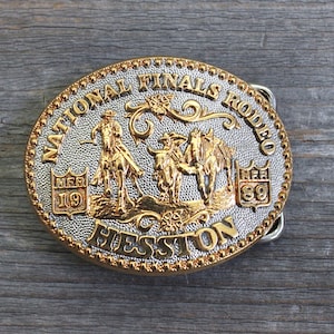 Hesston 1989  NFR Gold & Silver *SMALL * Team Roping  Belt Buckle *Never worn*