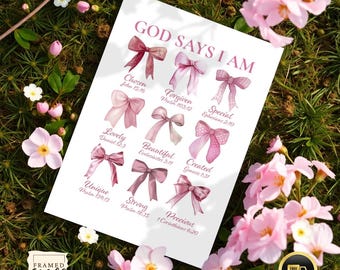 May include: A white print with the text "GOD SAYS I AM" and various affirmations like "Chosen" and "Forgiven," each paired with a bow illustration. The bows are in shades of pink and red. The print is surrounded by pink flowers.