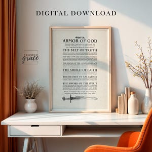 May include: A framed print with the text "Armor of God" in a light wood frame. The print features a list of spiritual concepts and a cross illustration. The words "Digital Download" are at the top.