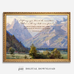 Puede incluir: Una impresión digital enmarcada con un paisaje de montañas y árboles en acuarela. La obra de arte incluye texto del Salmo 121:1-2, en un marco dorado ornamentado.