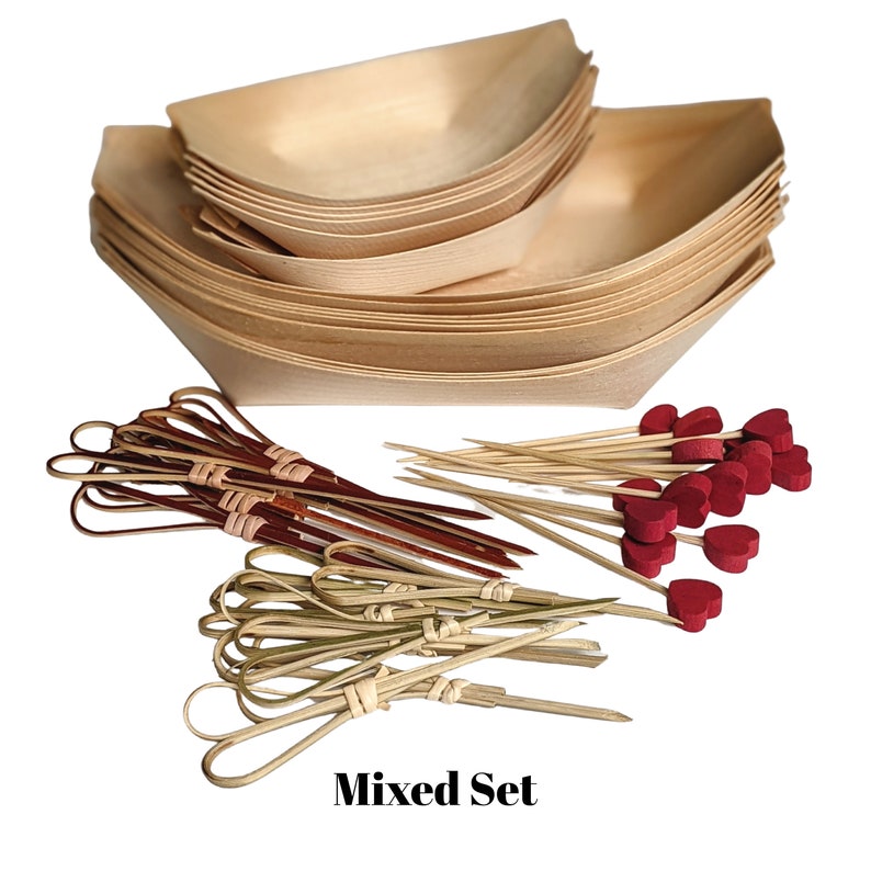 May include: A set of disposable wooden bowls and bamboo skewers with red heart-shaped toppers. The bowls are stacked and the skewers are arranged in a fan shape. The text "Mixed Set" is printed on the bottom of the image.