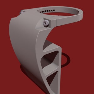 May include: A gray plastic 3D printed object with a circular opening at the top and a series of triangular cutouts on the side.