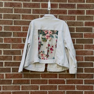 Reworked white floral jean Jacket