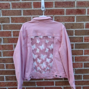 Reworked pink butterfly jean Jacket
