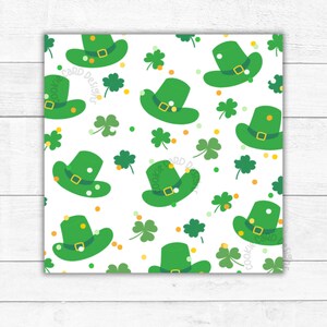 May include: A seamless pattern featuring green leprechaun hats, shamrocks, and gold confetti on a white background.