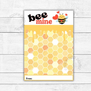 May include: A Valentine's Day card with a bee theme. The card features the words "bee mine" in black and red, a cartoon bee with hearts, and a honeycomb pattern in yellow and orange. The bottom has a space to write "From:"