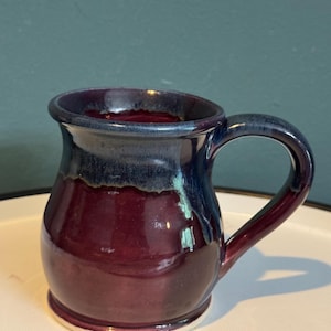 Potbelly style studio pottery mug with two toned glaze - blue and dark red