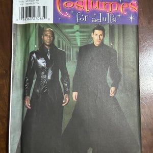 May include: A Simplicity sewing pattern envelope 5386 for adult costumes. The cover features two long black coats, one with a glossy finish and one with a matte texture, displayed against a dark hallway background with the text Costumes for adults.