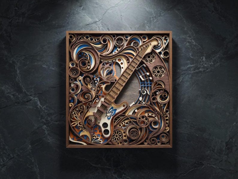 May include: A layered wooden art piece featuring a guitar design. The artwork incorporates intricate cutouts and swirling patterns in shades of brown, blue, and orange, set within a wooden frame. The guitar's body has a white and orange design.