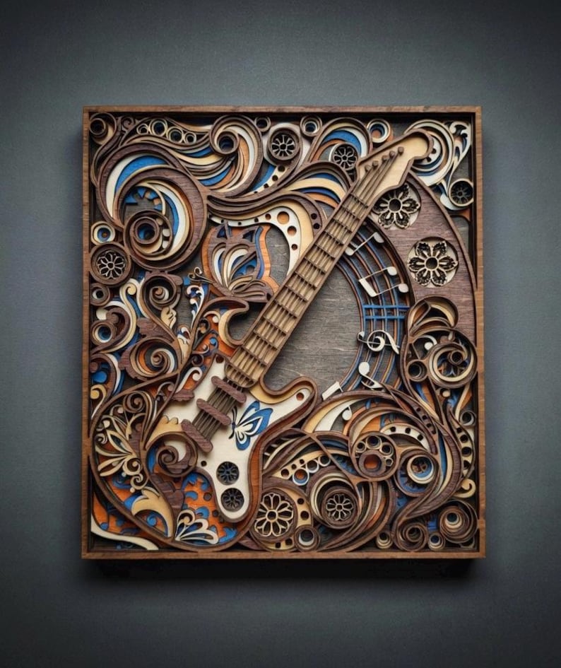 May include: A wooden layered art piece featuring an electric guitar design. The artwork incorporates swirling patterns, floral elements, and musical notes in shades of brown, blue, orange, and white, all within a square frame.
