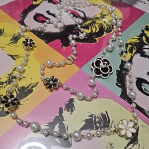 Long Pearl Designer Necklace 5 charm and flower charms designer jewelry
