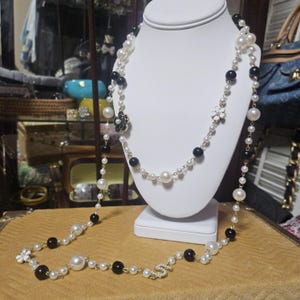 Long Designer Pearl necklace black and white 5 design charm and flower charms