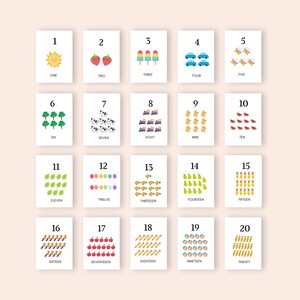 May include: A set of 20 colourful flashcards with numbers 1 through 20 and corresponding illustrations. Each card features a different illustration, such as a sun, strawberries, ice cream cones, cars, butterflies, trees, cows, trains, stars, watermelons, leaves, lollipops, fish, pears, pencils, birds, apples, pencils, balls, and carrots.