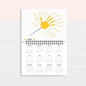Celebrate your child’s growth with this handprint calendar for 2027!
This  handprint calendar allows you to create lasting memories with your child’s handprints each month. Simply add your child’s handprints to this printable handprint calendar, and you’ll have a unique, creative, and meaningful way to celebrate the year.