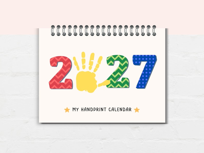 Celebrate your child’s growth with this handprint calendar for 2027!
This  handprint calendar allows you to create lasting memories with your child’s handprints each month. Simply add your child’s handprints to this printable handprint calendar, and you’ll have a unique, creative, and meaningful way to celebrate the year.
