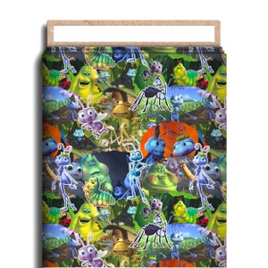May include: Fabric featuring a colorful pattern of cartoon insects, including ants, caterpillars, and ladybugs, set against a backdrop of green foliage and blue skies. The design is vibrant and playful, with a variety of insect characters.