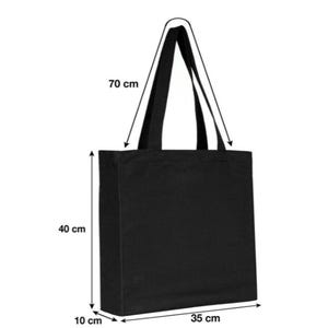 K&ouml;nnte beinhalten: Schwarze Canvas-Tragetasche mit zwei Henkeln. Die Tasche ist 10 cm breit, 40 cm hoch und 35 cm lang.
