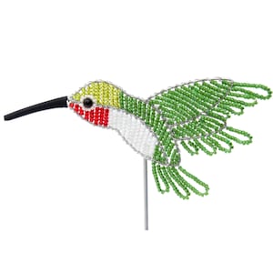 May include: A green, red, white, and yellow beaded hummingbird figurine. The hummingbird is made of wire and beads and is perched on a wire stand.