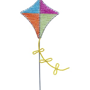 May include: A colorful beaded kite with a yellow string. The kite is a diamond shape with four sections of blue, pink, orange, and green beads.