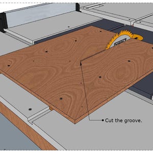 May include: A table saw with a light gray surface and a wooden frame features a circular yellow blade cutting into a rectangular piece of wood. A thin black line points to the wood with the text "Cut the groove." The setup includes a fence.