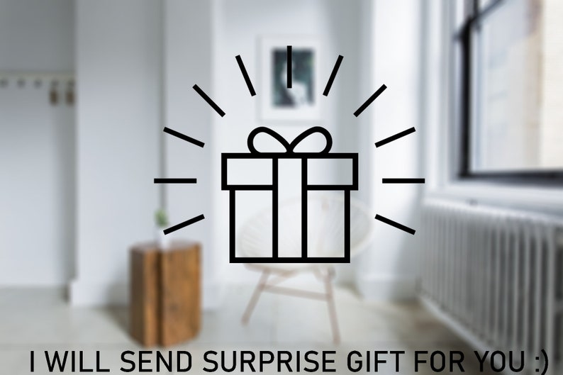 May include: A black and white illustration of a gift box with a bow on top. The gift box is surrounded by a burst of light rays. The text "I WILL SEND SURPRISE GIFT FOR YOU :)" is at the bottom of the image.