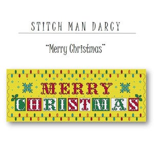May include: A yellow cross-stitch pattern with a red and green "Merry Christmas" message. The pattern includes a border of yellow, green, and red circles.