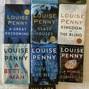 May include: A collection of ten books by Louise Penny and Hillary Rodham Clinton, including titles such as How the Light Gets In, The Long Way Home, The Nature of the Beast, A Great Reckoning, Glass Houses, Kingdom of the Blind, A Better Man, All the Devils Are Here, A World of Curiosities, and State of Terror.