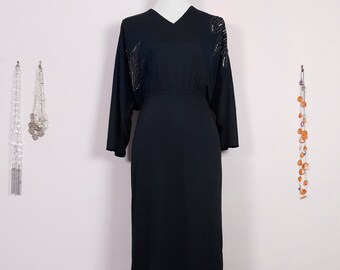 Elegante vestido negro vintage de los años 70 con cuentas y lentejuelas - Talla 8/10