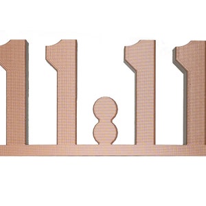 May include: A copper-coloured decorative piece featuring the numbers "11.11" with a stylized infinity symbol. The design is cut out, creating a negative space effect. The piece is likely made of wood or a similar material.