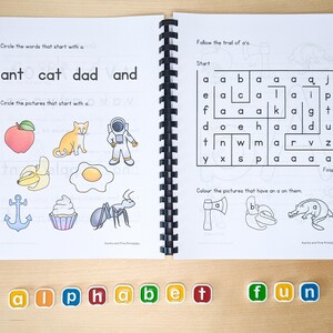 May include: A black and white workbook with activities for learning the letter 'a'. The workbook has a title that says "alphabet fun".