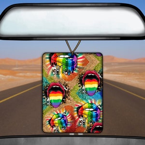 May include: A rainbow-colored car air freshener with a glitter background and a design of lips and tongues.