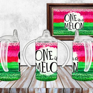 May include: Three clear plastic cups with handles and a straw. The cups are decorated with a watermelon pattern and the text "One in a Melon".