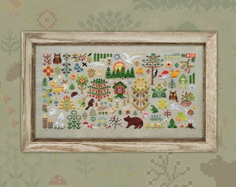 May include: A framed cross-stitch featuring a woodland scene with various animals, trees, and flowers. The design includes a bear, fox, owl, and other creatures, all rendered in colorful thread. The frame is a light, natural wood.