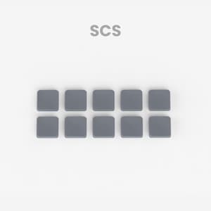 May include: A set of twelve gray square-shaped keycaps for a mechanical keyboard. The keycaps are arranged in two rows of six. The word "SCS" is printed in white above the keycaps.