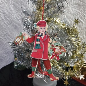 Articulated Christmas Ornament Pull String, Flat Wooden Double Sided Ornament, Boy with Christmas Horn  Ornament, 1990s