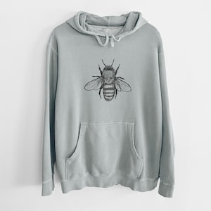 May include: A light gray hooded sweatshirt with a black and white bee illustration on the front.
