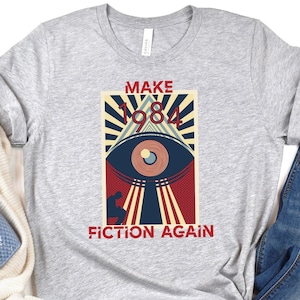 Make 1984 Fiction Again George Orwell Bella+Canvas Unisex Softstyle T-Shirt | The Nothin&#39; Farm