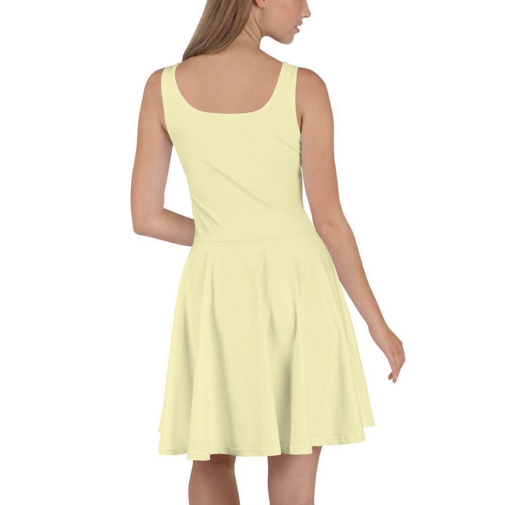 pastel yellow skater dress Plunge Halterneck Open Back Flippy Hem Mini Skater Dress In Pastel Yellow Slinky | EGO US