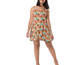 May include: A white skater dress with a pattern of breakfast foods, including pancakes, bacon, eggs, and toast. The dress has a sleeveless design and a fitted bodice.