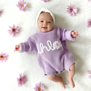 Personalized knit romper for baby.