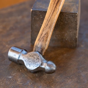 Plumb ball peen outlet hammer