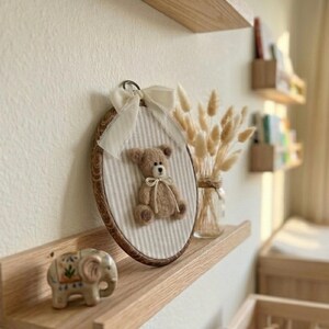 Handmade felt teddy bear nursery wall art in neutral colors