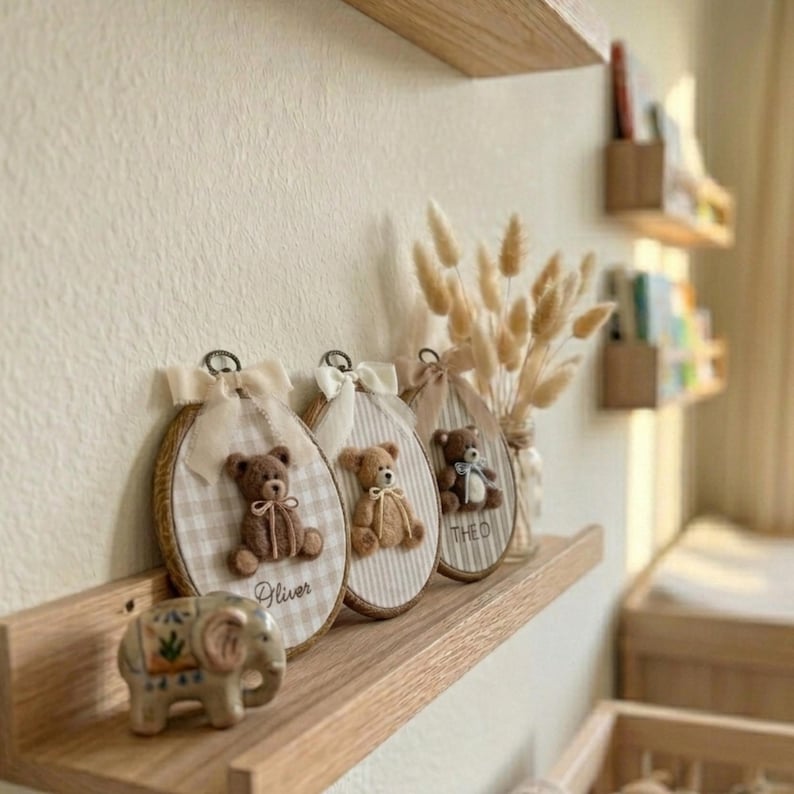 Needle felted teddy bear nursery decor displayed on a nursery shelf