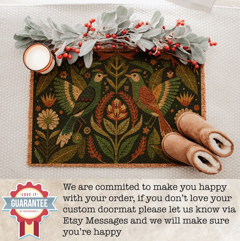 May include: A green, brown and orange doormat with a floral and bird design. The doormat has a fringed border. The text "LOVE IT - GUARANTEE" is on a red and white circular sticker.
