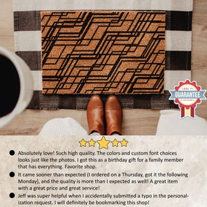 May include: A brown doormat with a black geometric pattern. The doormat has a "Love It - Guarantee" sticker on the bottom right corner.