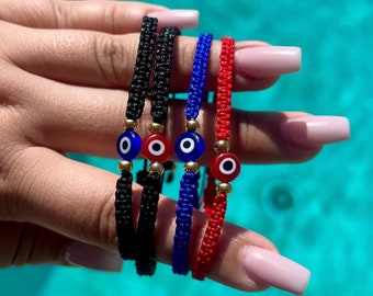 Pulsera de protección hecha a mano con el ojo turco, cordón rojo.